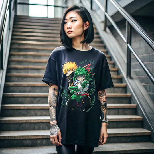 A dynamic Deku T-Shirt featuring graphic art of Izuku Midoriya, Katsuki Bakugo, and All Might from My Hero Academia on a black background.