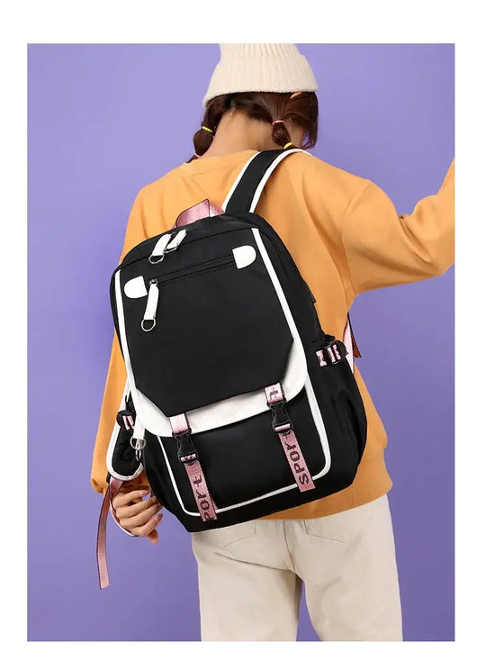 A durable Kamado Tanjirou Backpack featuring the green checkered pattern, large capacity storage, and high-quality zippers for teenagers.