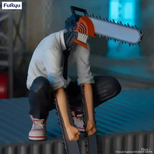 A posable Chainsaw Man Denji Figure and Power action model (1560) made of PVC, featuring interchangeable parts for an adult collectible display.