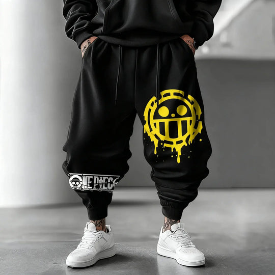 Trendy One Piece Graphic Joggers featuring anime character prints, designed as casual Y2K streetwear sweatpants for men and women.