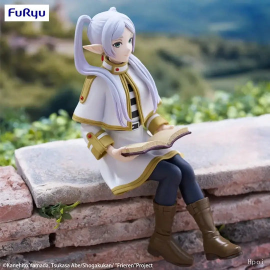 A high-quality 14cm Frieren Anime Figure sitting down, functioning as a noodle stopper and desktop decoration.