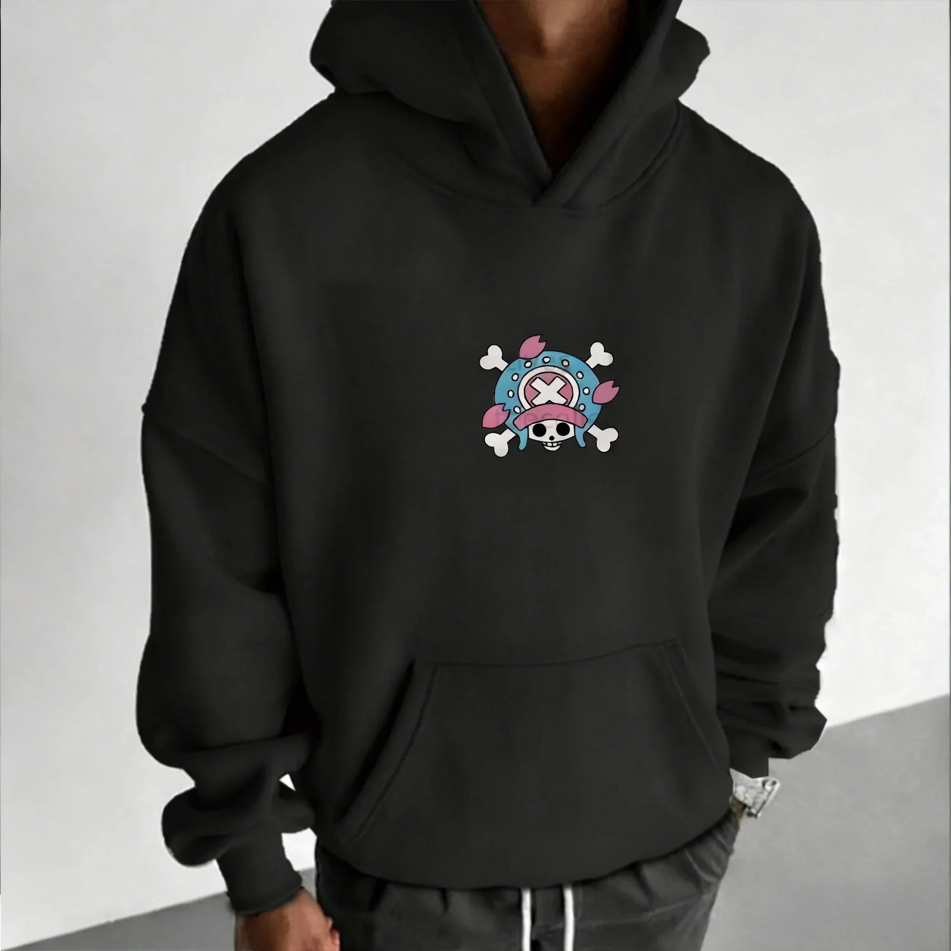A loose-fit Tony Tony Chopper Hoodie featuring a cute anime graphic print, designed as American street hip hop wear for men and children.