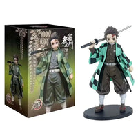 A highly detailed 16cm Demon Slayer Anime Figure made of premium PVC, showcasing Kamado Tanjiro in a dynamic warrior action pose for desktop decoration.