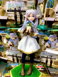 A high-quality 14cm Frieren Anime Figure sitting down, functioning as a noodle stopper and desktop decoration.