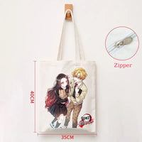 A durable Demon Slayer Canvas Bag featuring Kamado Nezuko and Tanjiro anime graphics, designed as a zipper tote for students and shoppers.