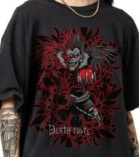 A trendy Death Note T-shirt featuring high-definition anime graphic art of Light Yagami and Ryuk, designed as a unisex Japanese manga top.