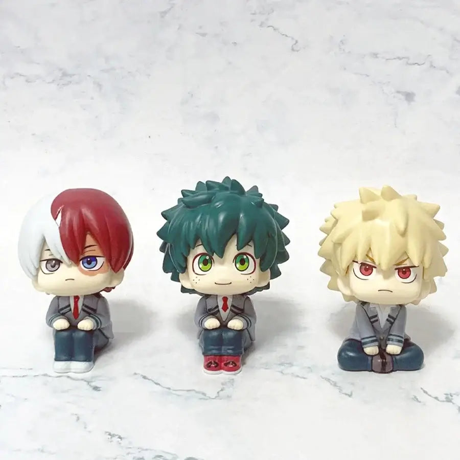 A highly detailed 18cm My Hero Academia Anime Figure made of PVC, featuring action poses of All Might, Deku, and Bakugo for collectors.