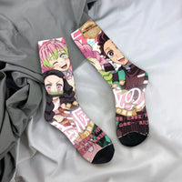 Breathable Demon Slayer Socks featuring Nezuko Kamado and Giyu Tomioka patterns, designed as trendy non-slip skateboard stockings for men and women.