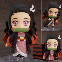 High-quality Demon Slayer Nendoroid Figures featuring Kamado Tanjiro, Nezuko, and Uzui Tengen posing for an upscale anime collection display.