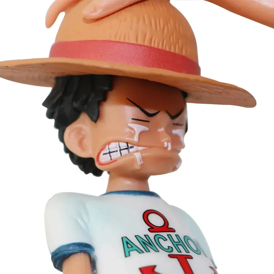 A high-quality 18cm One Piece Luffy Action Figure made of PVC, featuring Monkey D. Luffy in a classic standing pose for anime desktop decoration.