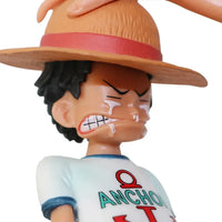 A high-quality 18cm One Piece Luffy Action Figure made of PVC, featuring Monkey D. Luffy in a classic standing pose for anime desktop decoration.