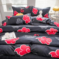 A creative Naruto Akatsuki Bedding four-piece set featuring cute 2D cartoon anime characters on a duvet cover and bed sheets.