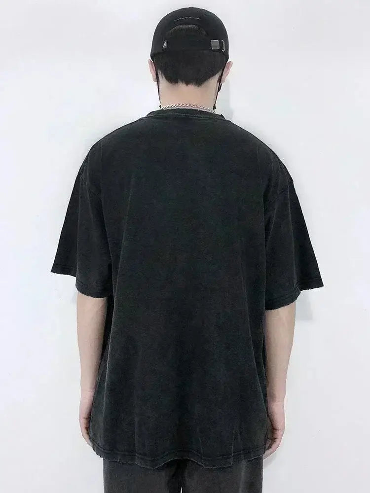 Retro Washed Anime Ghost Slayer Blade Oversized T-shirt for men and women on model