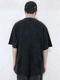 Retro Washed Anime Ghost Slayer Blade Oversized T-shirt for men and women on model