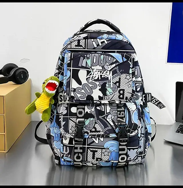 A high-capacity One Piece Luffy Backpack featuring a vibrant graffiti print of Monkey D. Luffy, designed as a durable school bag for middle and high students.