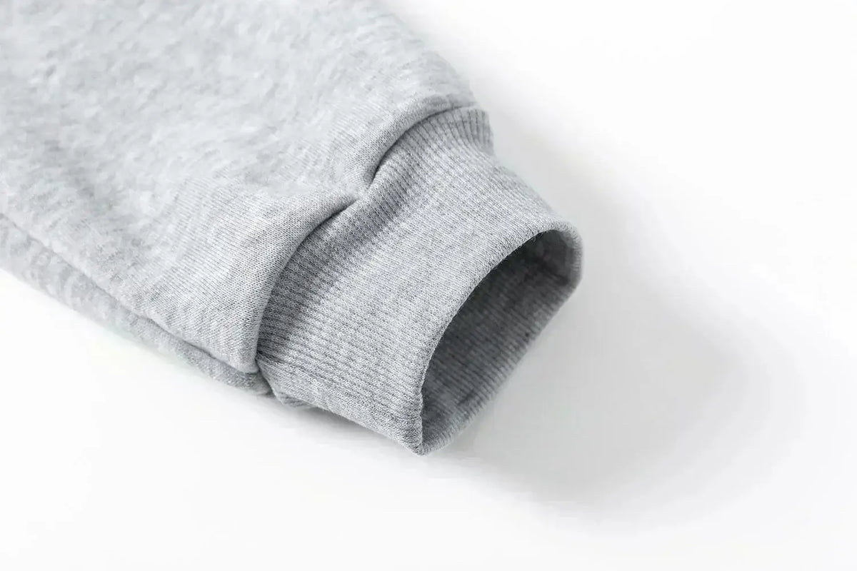 Trendy One Piece Graphic Joggers featuring anime character prints, designed as casual Y2K streetwear sweatpants for men and women.