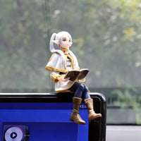 A high-quality 14cm Frieren Anime Figure sitting down, functioning as a noodle stopper and desktop decoration.