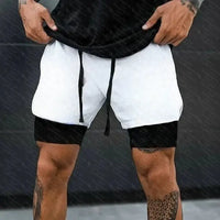 A man wearing the white One Piece Running Shorts for the gym, with a double layer and Straw Hat Crew design.