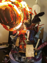 A dynamic Luffy Gear 3 Figure made of PVC, featuring glowing LED Red Roc fire effects, designed as a GK anime collectible statue.