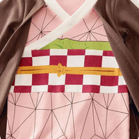 A newborn infant wearing one of the Anime Baby Rompers, a cosplay costume available in Akatsuki, Nezuko, and Tanjirou styles.