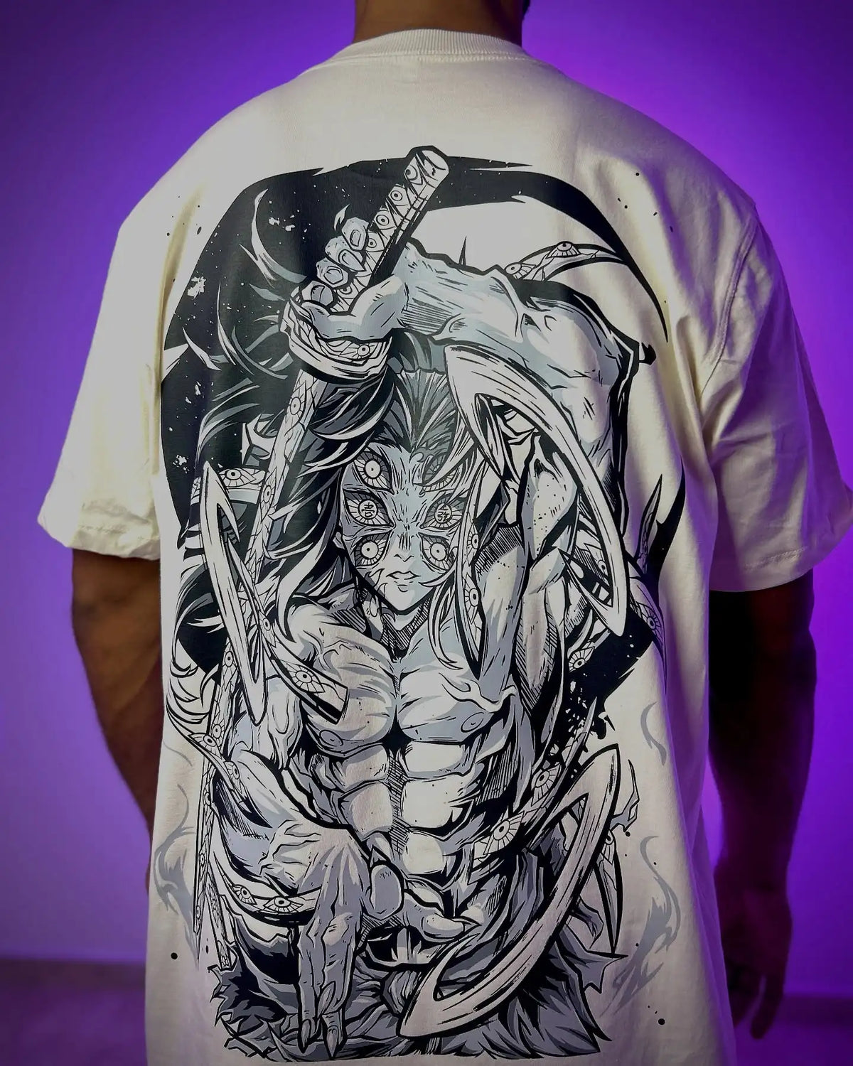 A couple wearing matching oversized Demon Slayer Graphic T Shirts in a hip hop, Y2K streetwear style.