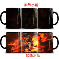A ceramic One Piece Color Changing Mug revealing Gear 5 Nika Luffy and Fire Fist Ace artwork when filled with hot liquid.