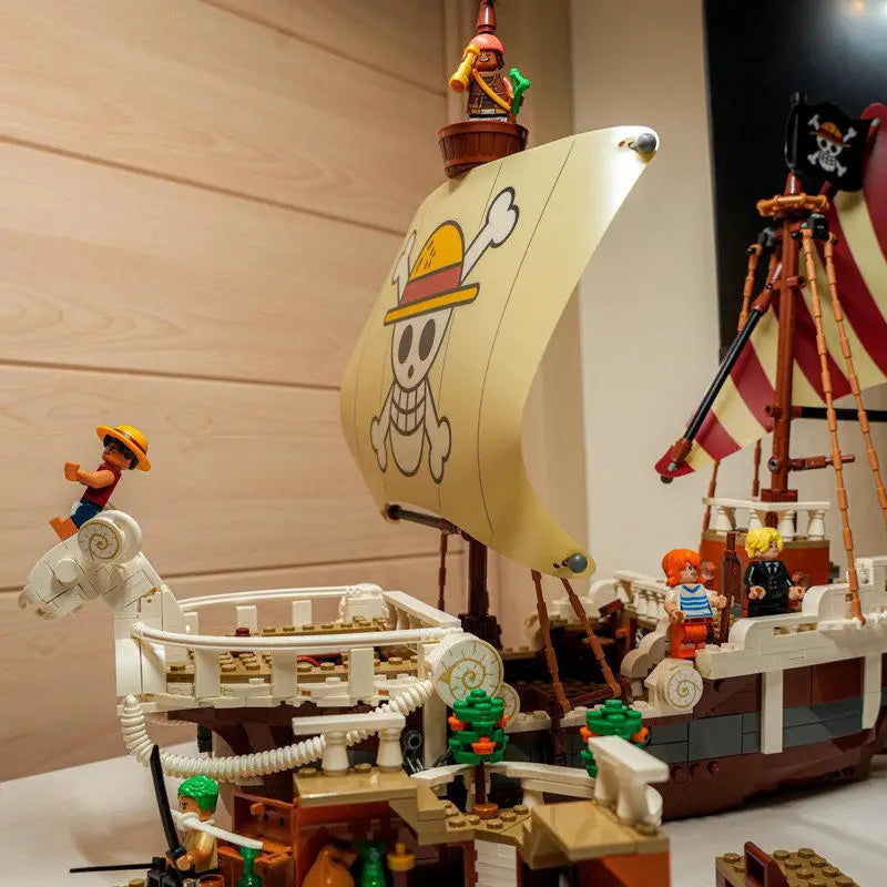A detailed One Piece Going Merry Building Blocks set featuring the Straw Hat Pirate Ship, designed as an assembly model toy for children and collectors.