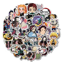A mixed pack of waterproof Demon Slayer Stickers featuring cute Tanjiro and Nezuko anime art, applied to a laptop and phone case.