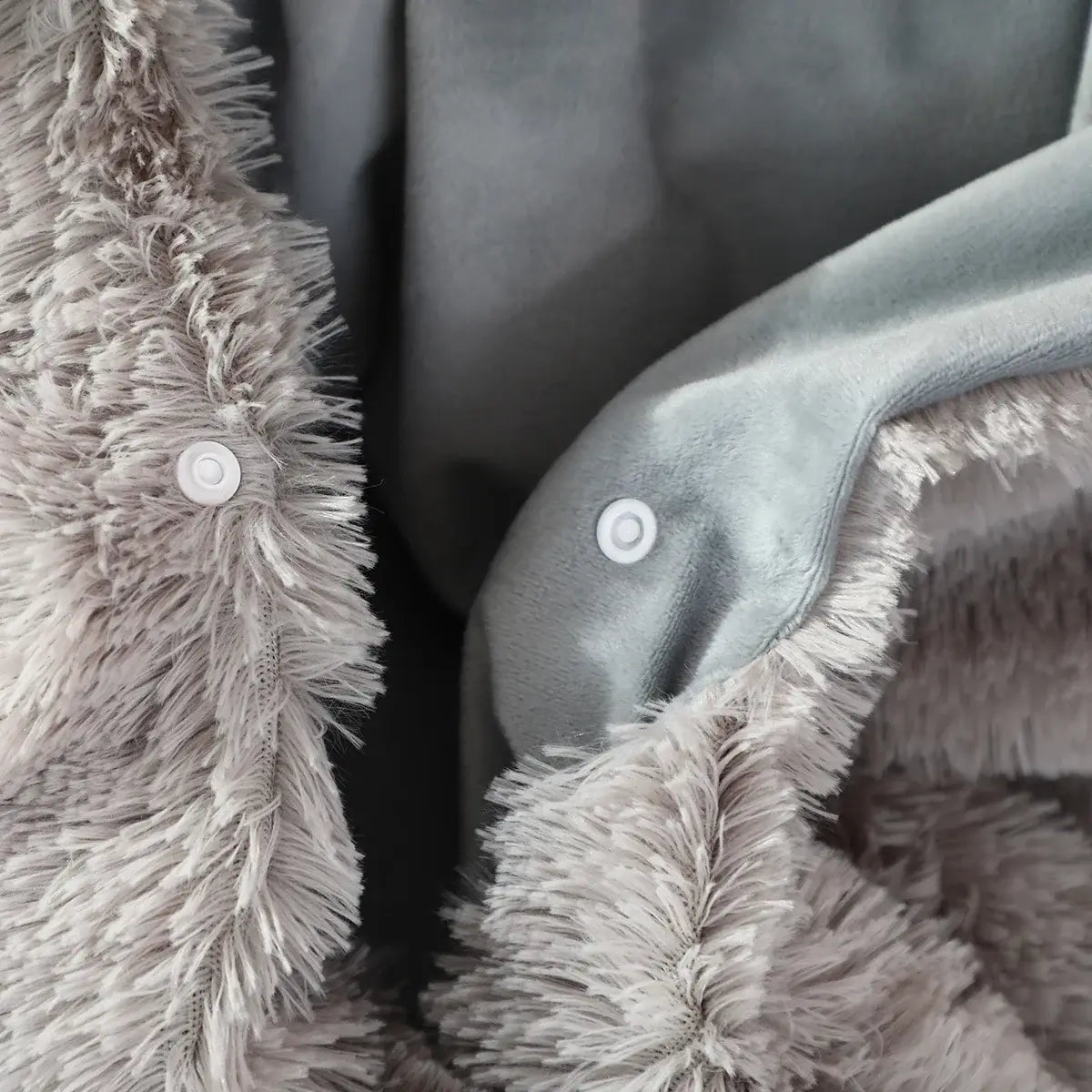 Close-up of Inosuke Boar Head Plush Cosplay Neck Pillow showcasing soft texture and snap buttons, perfect for travel.