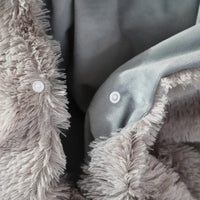 Close-up of Inosuke Boar Head Plush Cosplay Neck Pillow showcasing soft texture and snap buttons, perfect for travel.