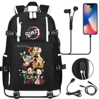 A pink and black Nezuko Demon Slayer Backpack featuring a USB charging port and kawaii anime character art, designed for teen girls and students.