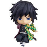 High-quality Demon Slayer Nendoroid Figures featuring Kamado Tanjiro, Nezuko, and Uzui Tengen posing for an upscale anime collection display.