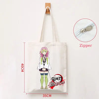 A durable Demon Slayer Canvas Bag featuring Kamado Nezuko and Tanjiro anime graphics, designed as a zipper tote for students and shoppers.