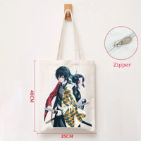 A durable Demon Slayer Canvas Bag featuring Kamado Nezuko and Tanjiro anime graphics, designed as a zipper tote for students and shoppers.