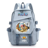 A lightweight canvas One Piece Backpack featuring kawaii anime characters, suitable for school, travel, and carrying a laptop computer.