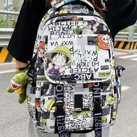 A high-capacity One Piece Luffy Backpack featuring a vibrant graffiti print of Monkey D. Luffy, designed as a durable school bag for middle and high students.