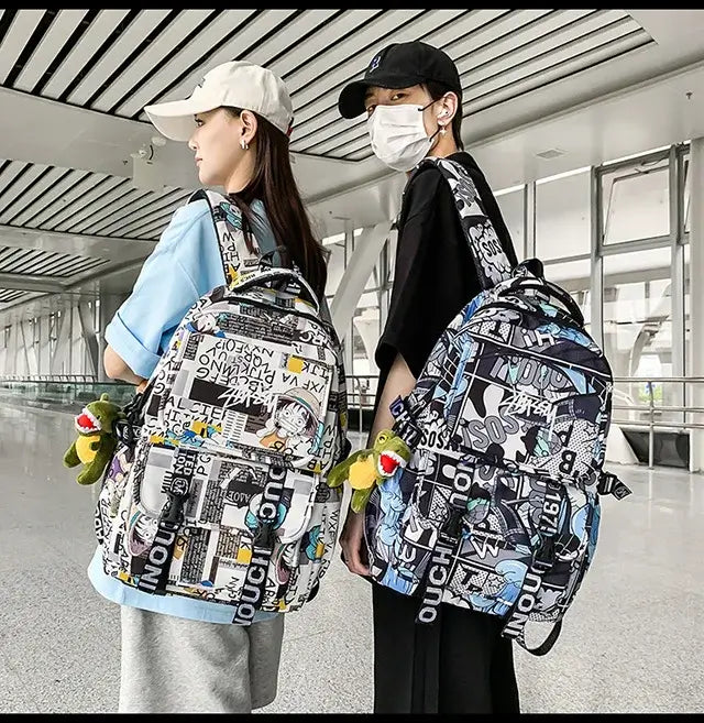 A high-capacity One Piece Luffy Backpack featuring a vibrant graffiti print of Monkey D. Luffy, designed as a durable school bag for middle and high students.