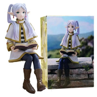A high-quality 14cm Frieren Anime Figure sitting down, functioning as a noodle stopper and desktop decoration.