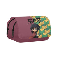 A 3-piece Demon Slayer Backpack Set featuring Tanjiro and Nezuko anime art, including a school bag, lunch box, and pencil case for elementary students.