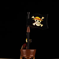 A Going Merry LED Light Set illuminating the 75639 pirate ship building block model, showcasing glowing cabins and deck lights.