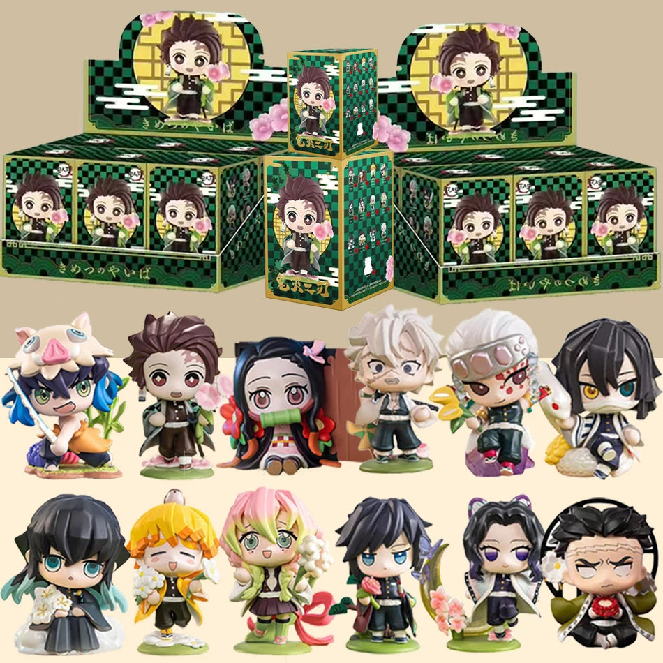 A colorful Demon Slayer Blind Box containing a random cute PVC anime figure of Tanjiro or Nezuko, used as a desktop ornament.
