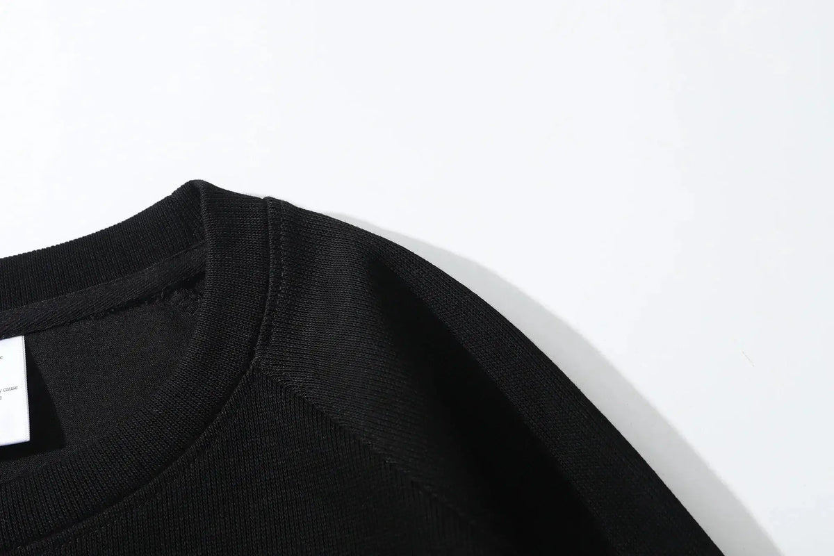 A comfortable Son Goku Hoodie featuring a Japanese anime graphic of Dragon Ball Z, designed as a long-sleeve parent-child outfit for men and boys.