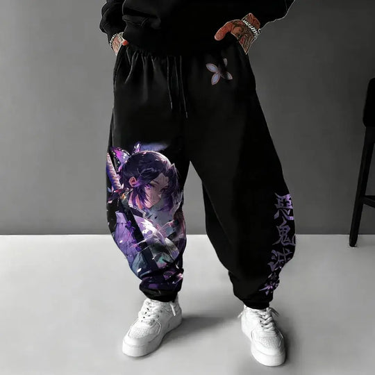 A pair of pure cotton Tokito Muichiro Jogger Pants featuring Japanese anime Demon Slayer graphic prints, designed as casual men's sport trousers.