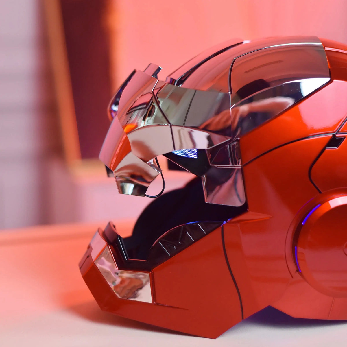 A wearable AutoKing Iron Man Helmet (Mk5) featuring voice-controlled opening face plates and glowing LED eyes for adult cosplay and display.
