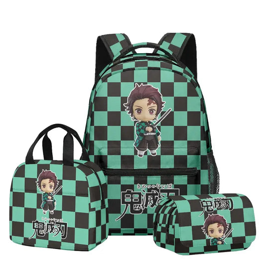 A 3-piece Demon Slayer Backpack Set featuring Tanjiro and Nezuko anime art, including a school bag, lunch box, and pencil case for elementary students.