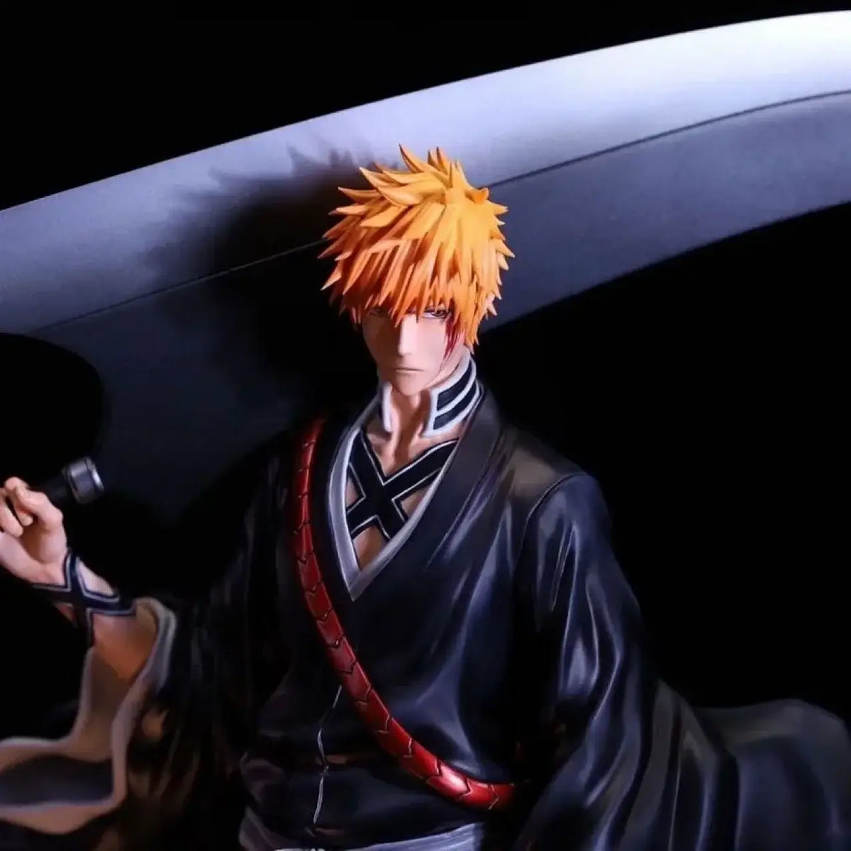 A vibrant Bleach Blind Box packaging revealing highly detailed anime action figures of Kurosaki Ichigo, Sosuke Aizen, and Rukia Kuchiki for collector display.