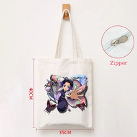 A durable Demon Slayer Canvas Bag featuring Kamado Nezuko and Tanjiro anime graphics, designed as a zipper tote for students and shoppers.