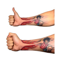 One Piece Temporary Tattoo Stickers illustration showing Luffy with fire fist design on a forearm.