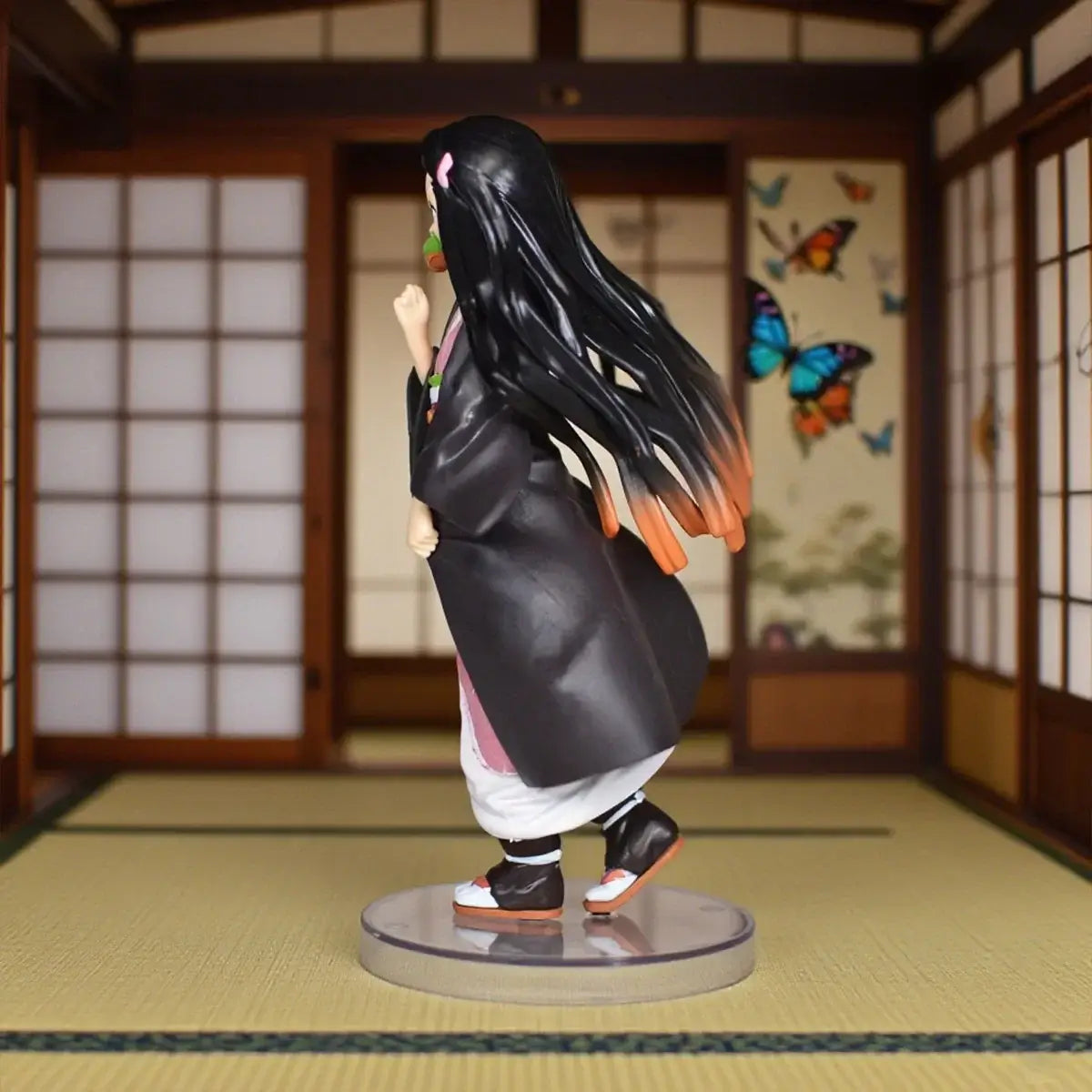 High-quality 19cm Nezuko Figure PVC anime statue from Demon Slayer, showcasing vibrant details perfect for desktop display and collector gifts.