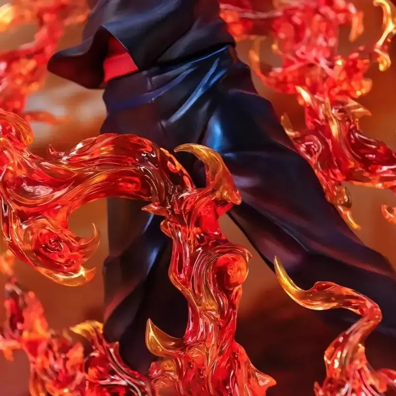 A highly detailed Ryomen Sukuna Figure made of premium PVC, showcasing the Jujutsu Kaisen King of Curses in an extreme battle stance for desktop decoration.